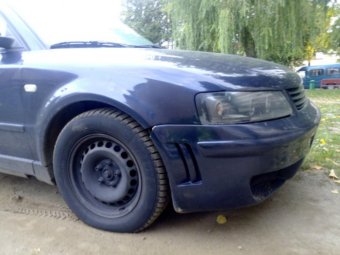 автомобиль без колеса