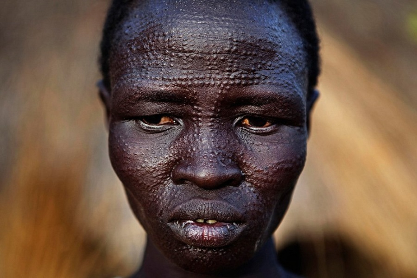 Чернокожий африканец. Племя Динка шрамирование. Негроидная Африканская раса.